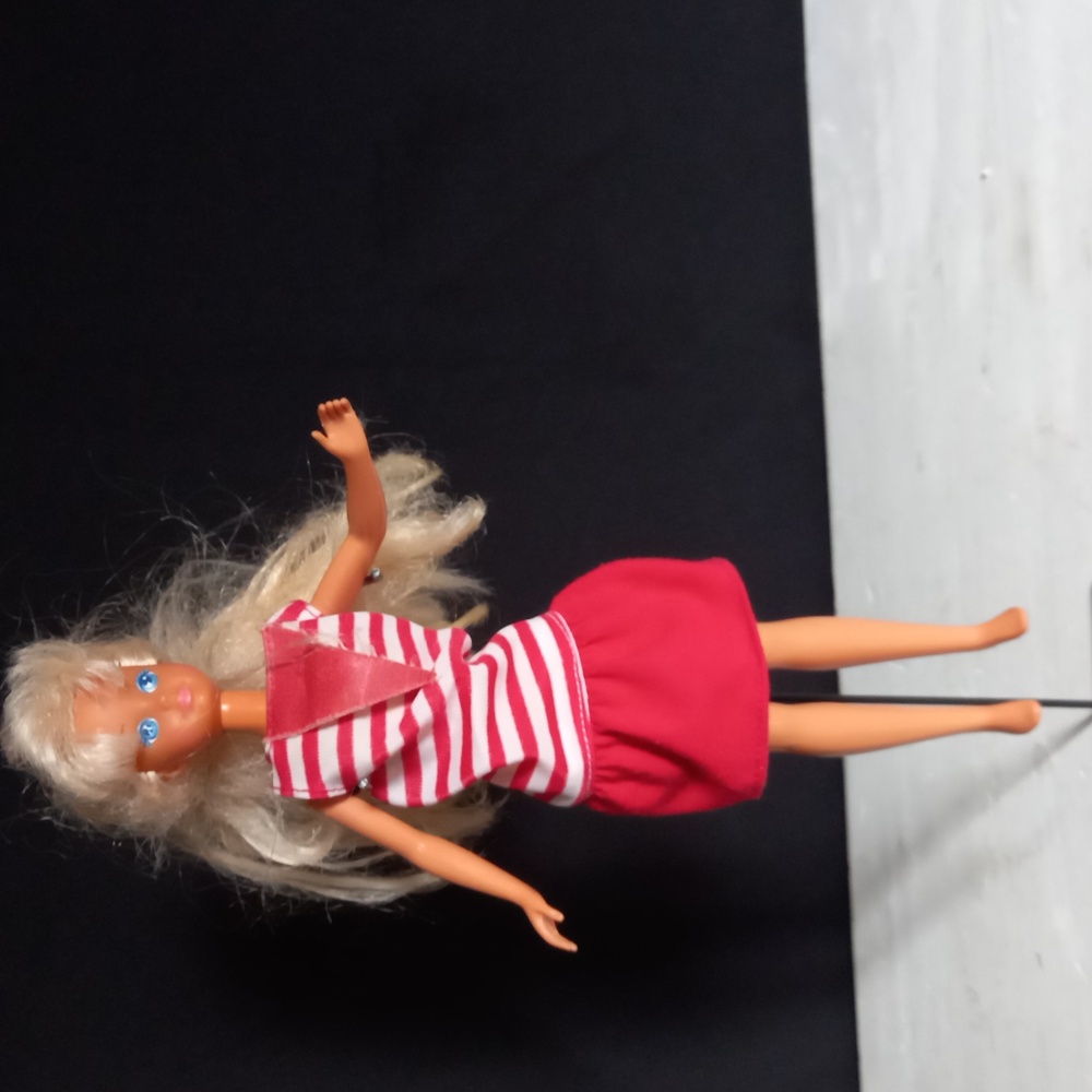 Barbie with red and white striped dress